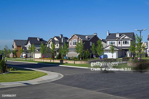 few suburban houses. - residential street stock pictures, royalty-free photos & images