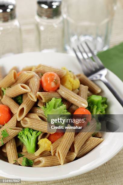 whole wheat pasta - macaroni salad stock pictures, royalty-free photos & images