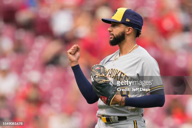 Devin Williams of the Milwaukee Brewers celebrates after striking out Nick Senzel of the Cincinnati Reds for the final out of the ninth inning at...