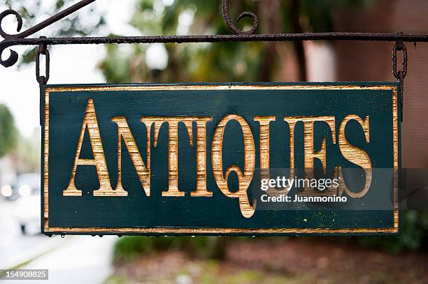 antiques sign - store sign stockfoto's en -beelden