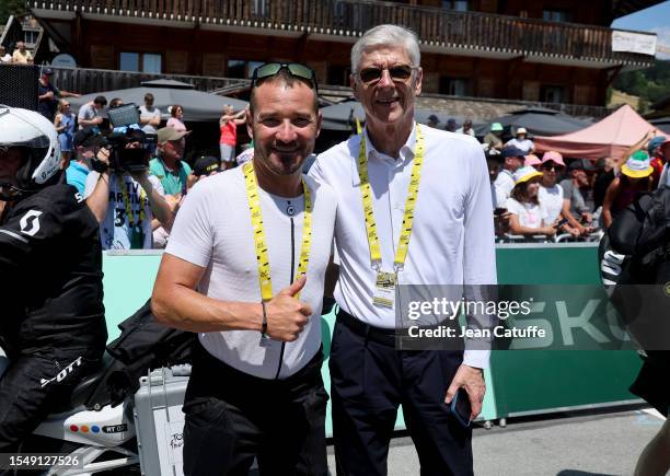 Thomas Voeckler and Arsene Wenger pose at the start of stage fifteen of the 110th Tour de France 2023, a 179km stage from Les Gets les Portes du...