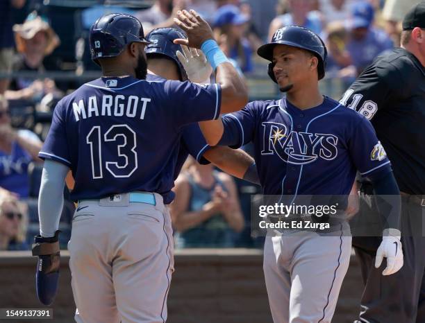 Francisco Mejia of the Tampa Bay Rays celebrates his three-run home run with Manuel Margot in the eighth inning against the Kansas City Royals at...