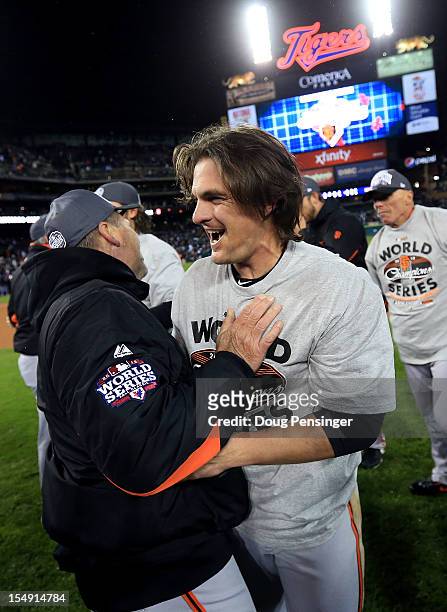 Ryan Theriot of the San Francisco Giants celebrates after defeating the Detroit Tigers to win Game Four of the Major League Baseball World Series at...