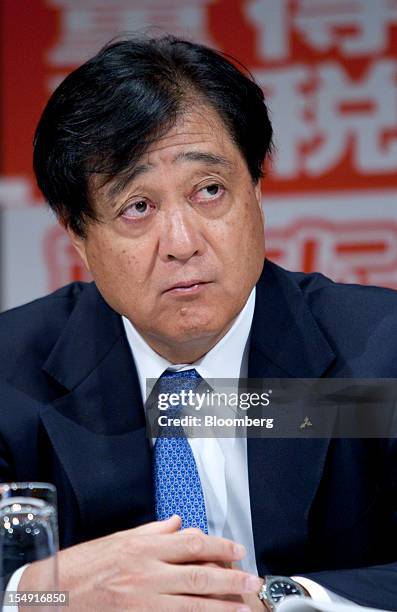 Osamu Masuko, president of Mitsubishi Motors Corp., attends a joint news conference hosted by the Japan Automobile Manufacturers Association Inc. In...