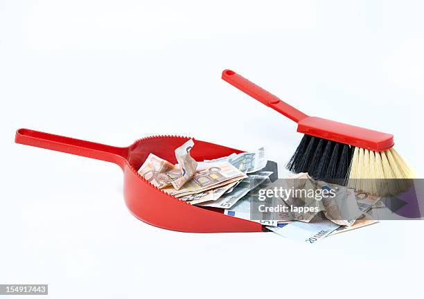 sweep the money - euros and trash stockfoto's en -beelden