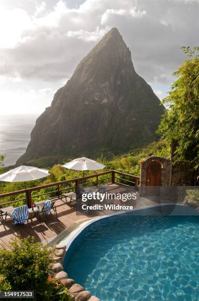 swimming pool with piton view - pitons stock pictures, royalty-free photos & images