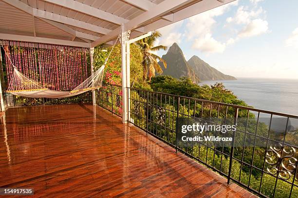 sit in hammock and enjoy twin piton view - metal decking stock pictures, royalty-free photos & images