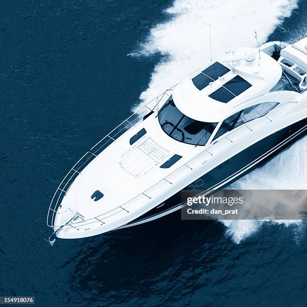 speeding powerboat - motorboat stock pictures, royalty-free photos & images