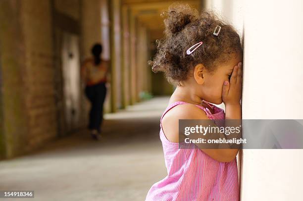 little girl (4-5) playing hide and seek with her mother - kid hide and seek stock pictures, royalty-free photos & images