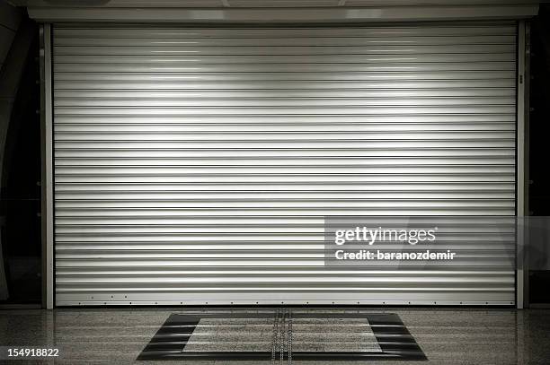 shop shutters - close door stock pictures, royalty-free photos & images