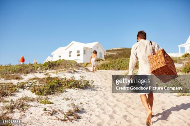 beach picnic - huisje stockfoto's en -beelden