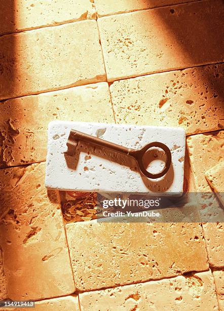 key to treasure - hiding money stock pictures, royalty-free photos & images