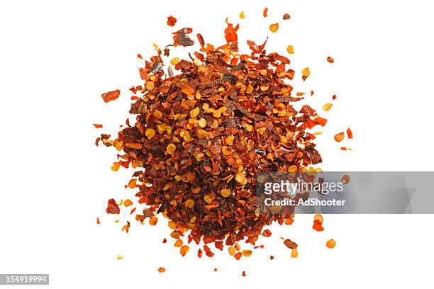red pepper flakes - dried food stock pictures, royalty-free photos & images