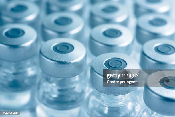 vials of medicine or vaccine - medicinflaska bildbanksfoton och bilder