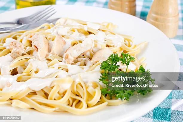 chicken fettuccine alfredo - bechamel sauce stock pictures, royalty-free photos & images