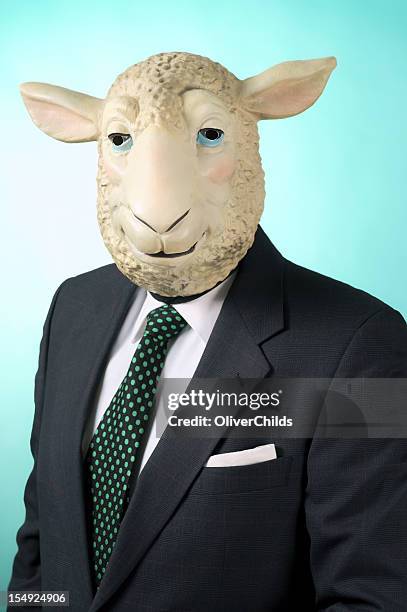 business man wearing sheep mask, portrait. - sheep funny stock pictures, royalty-free photos & images