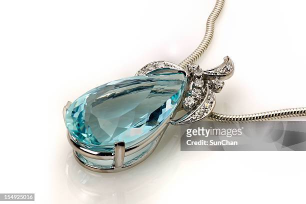 aquamarine or topaz white gold pendant - diamond gemstone stock pictures, royalty-free photos & images