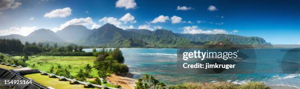 hanalei bay and emerald mountains pano, kauai, hawaii. - hanalei stock pictures, royalty-free photos & images