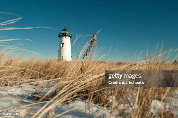 ground level view of a lighthouse in edgartown cape cod - cape cod stockfoto's en -beelden