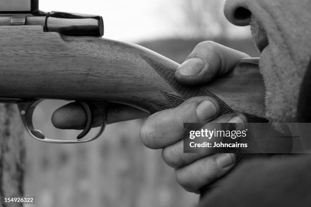deer hunter. - firing squad stock pictures, royalty-free photos & images