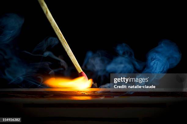 burning match - match lighting equipment stock pictures, royalty-free photos & images