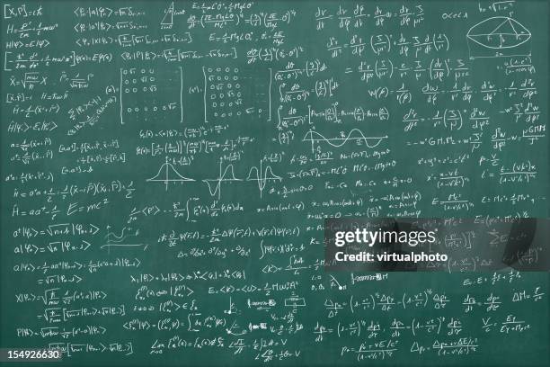 blackboard full of equations - physics equation stock pictures, royalty-free photos & images