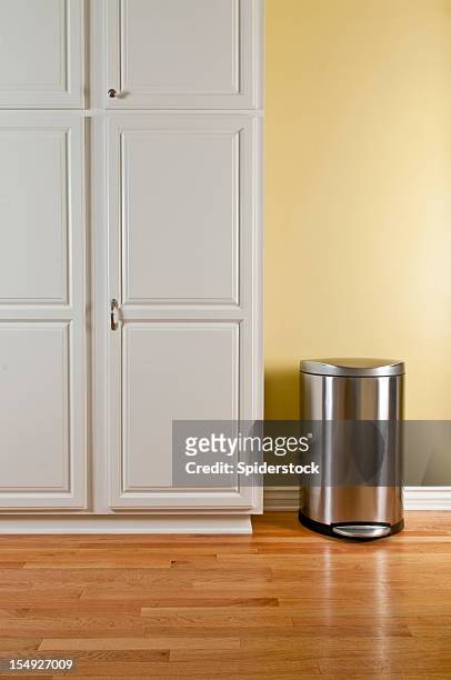 trash can and kitchen cabinets - cabinet door stock pictures, royalty-free photos & images