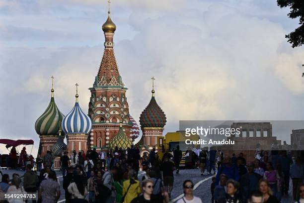 View of St. Basil's Cathedral and Spasskaya Bashnya Tower in Moscow, Russia on July 23, 2023.