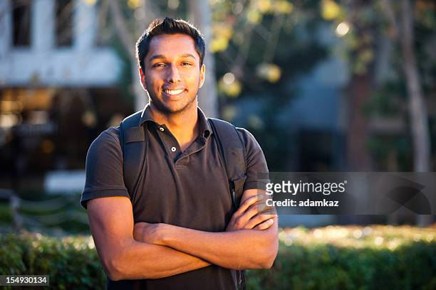 young indian college student - learn arabic stock pictures, royalty-free photos & images