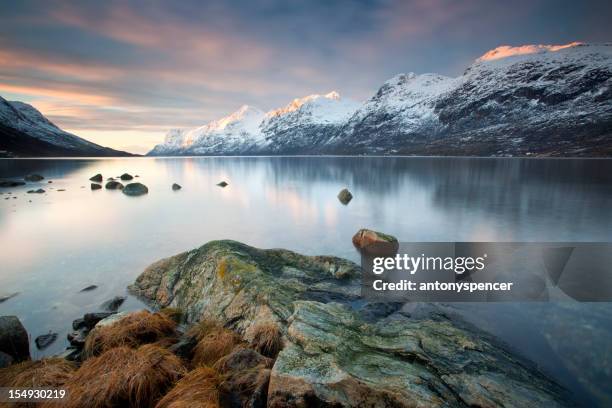 arktische sonnenuntergang - tromsö stock-fotos und bilder