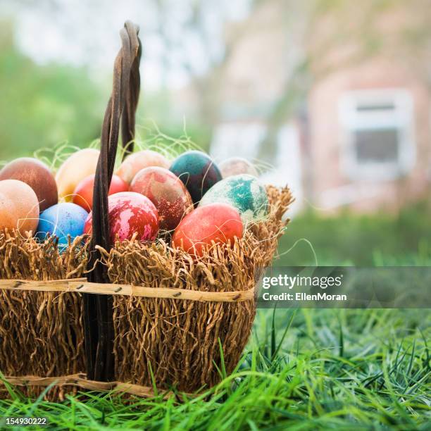 basket of colorful easter eggs - easter eggs basket bildbanksfoton och bilder