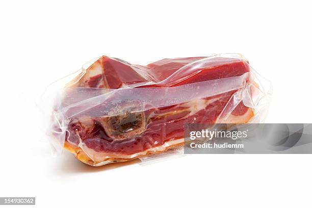 bacon isolated on white background - vacuum packed meat stock pictures, royalty-free photos & images