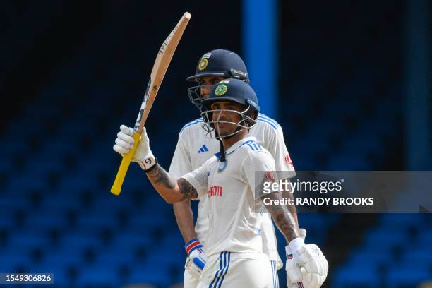 Ishan Kishan, of India, celebrates his half century during the fourth day of the second Test cricket match between India and West Indies at Queen's...
