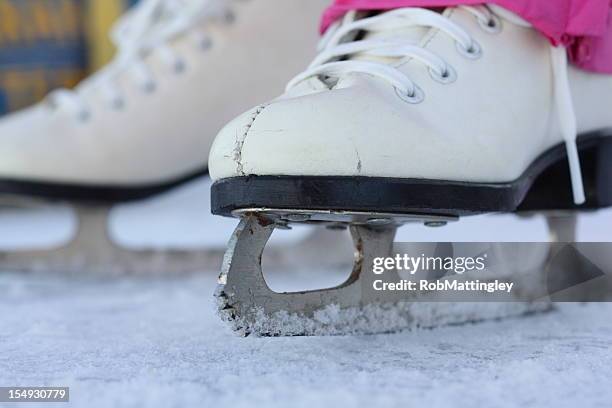 figure skates on ice - figure skating stockfoto's en -beelden