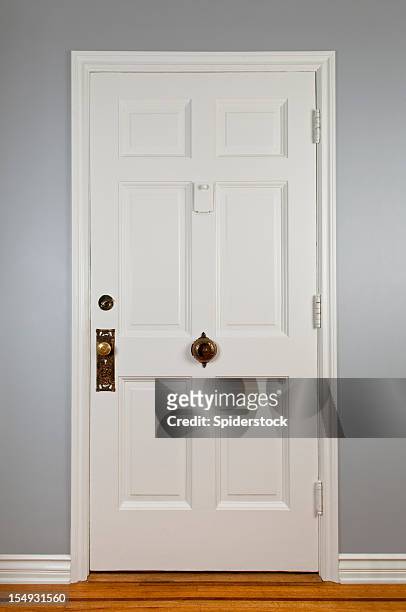 white front door - white doorway stock pictures, royalty-free photos & images
