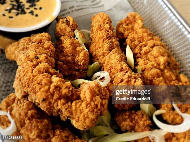 fried chicken fingers with mustard sauce - crunchy food stock pictures, royalty-free photos & images