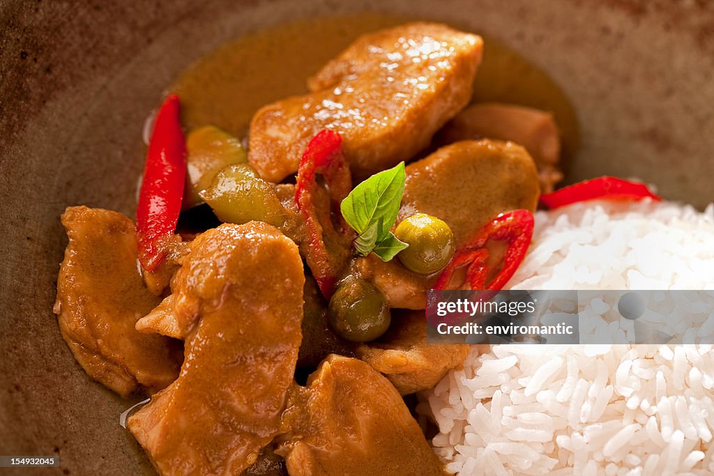 Thai chicken curry with rice in a bowl.