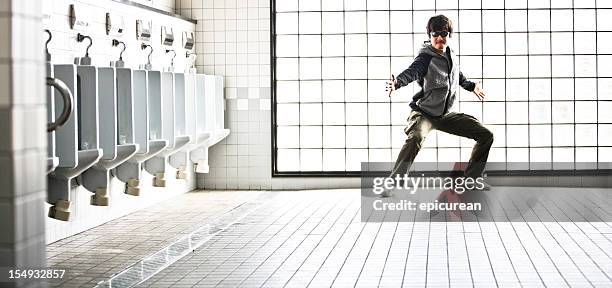 ninja in the bathroom - urinal stock pictures, royalty-free photos & images