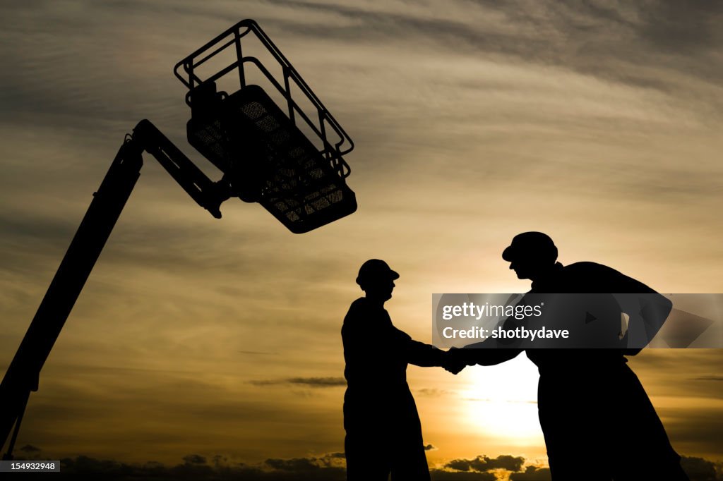 Apretón de manos con un ascensor