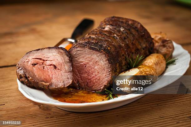 juicy roast beef - roast beef stock pictures, royalty-free photos & images