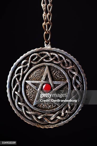 pentagram necklace - pendant light stockfoto's en -beelden