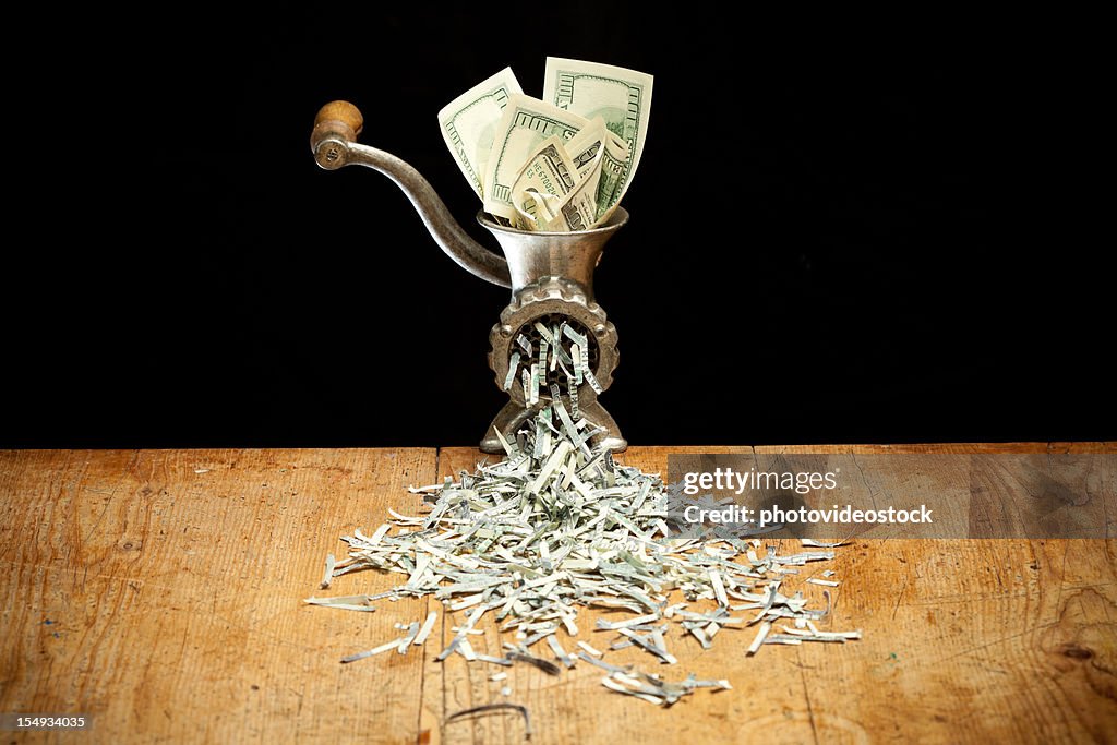 Destroying Dollars with a grinder