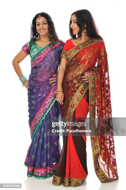 two indian women wearing saris - silk sari stock pictures, royalty-free photos & images