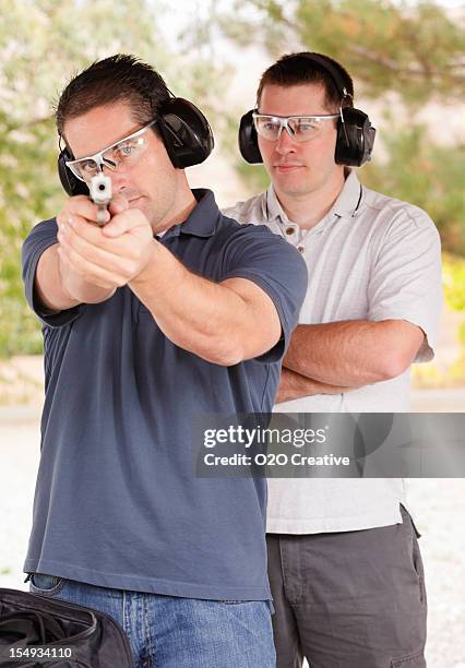 Gun Range Intructure 594 Gun Range Instructor Stock Photos, High-Res Pictures, and Images ...