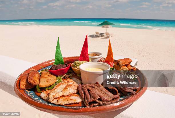 plate of authentic mexican food - playa del carmen stock pictures, royalty-free photos & images