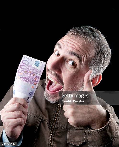 lucky man - five hundred euro banknote stock pictures, royalty-free photos & images