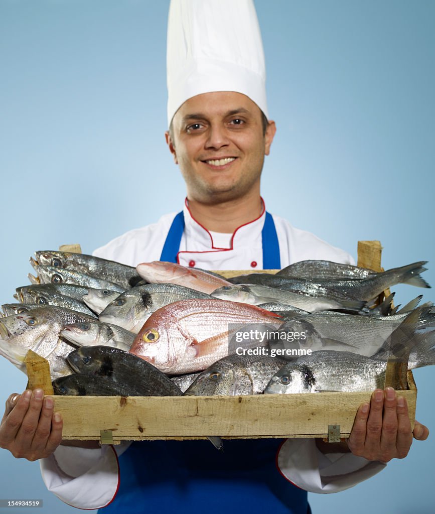 Chef Carrying Fish