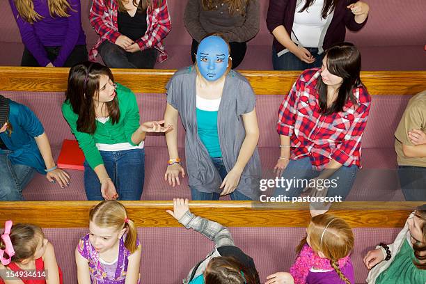 standing out in a crowd - congregation stockfoto's en -beelden