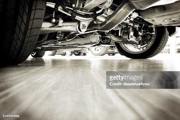 sportscar technik from below - machine part stock pictures, royalty-free photos & images