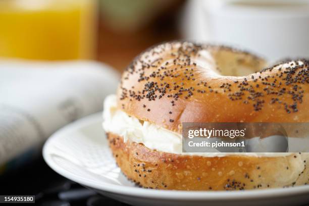 bagel - poppy seed stock-fotos und bilder